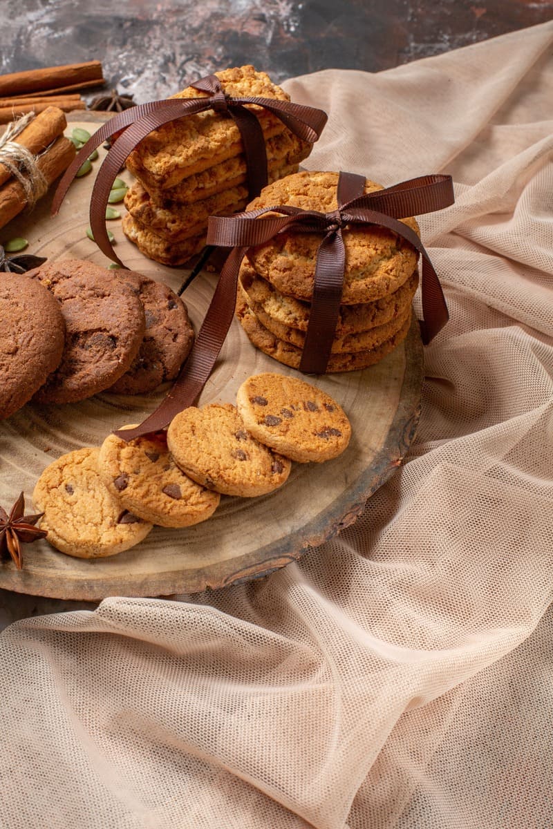 front view tasty sweet biscuits with cup coffee light background color cocoa sugar tea cake cookie sweet pie